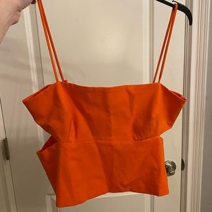 orange cropped tank with side cutouts